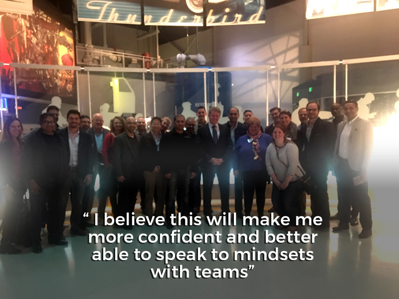 several people posing for picture with a quote at bottom saying 'I Believe this will make me more confident and better able to speak to mindsets with teams'
